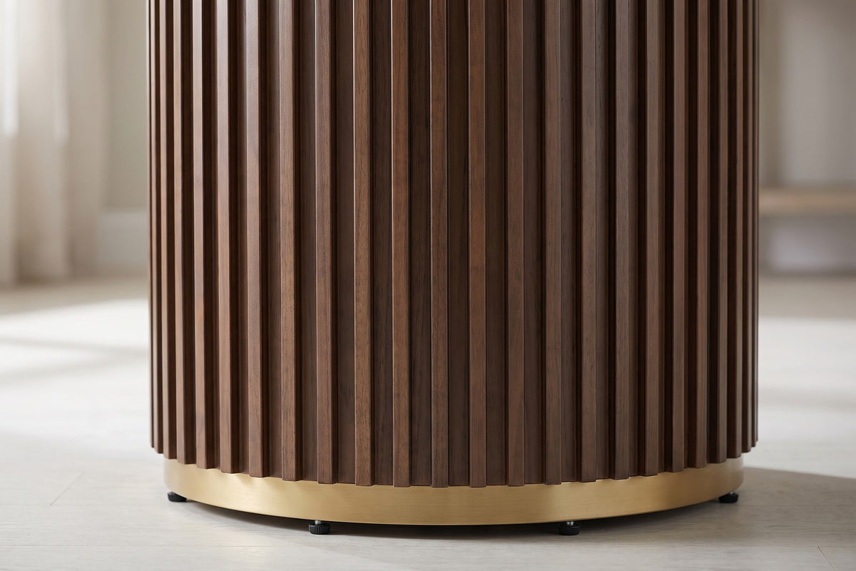 Close-up of the vertical walnut-finish slats of the drum pedestal and the slim gold-tone ring at its foot (Odeon)