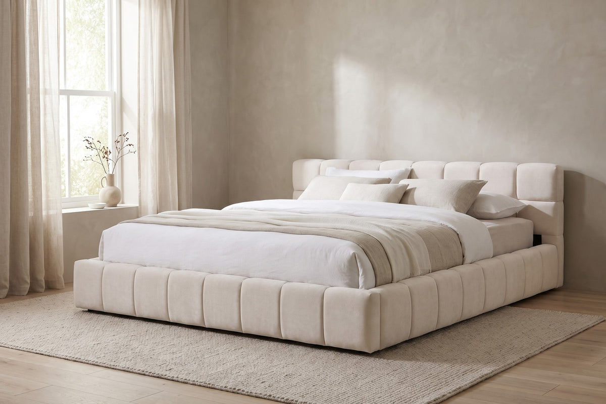 By a sheer-curtained window, the thick padded rails sit close to the floor.