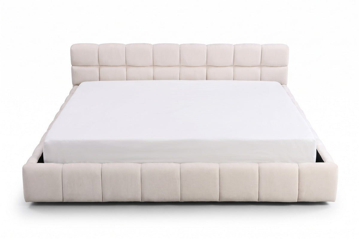 Odette cream-beige chenille king bed with a square-tufted headboard, straight front view from the foot of the bed, slightly above mattress height on a white background