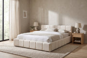Odette cream-beige chenille queen bed with a square-tufted headboard in a calm, daylit bedroom