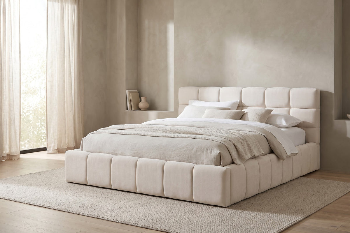 Odette cream-beige chenille queen bed with a square-tufted headboard in a calm, daylit bedroom