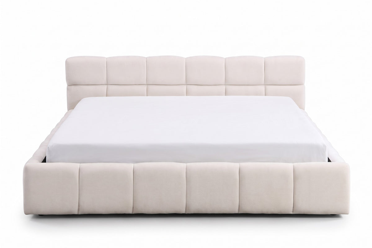 Odette cream-beige chenille queen bed with a square-tufted headboard, straight front view from the foot of the bed, slightly above mattress height on a white background
