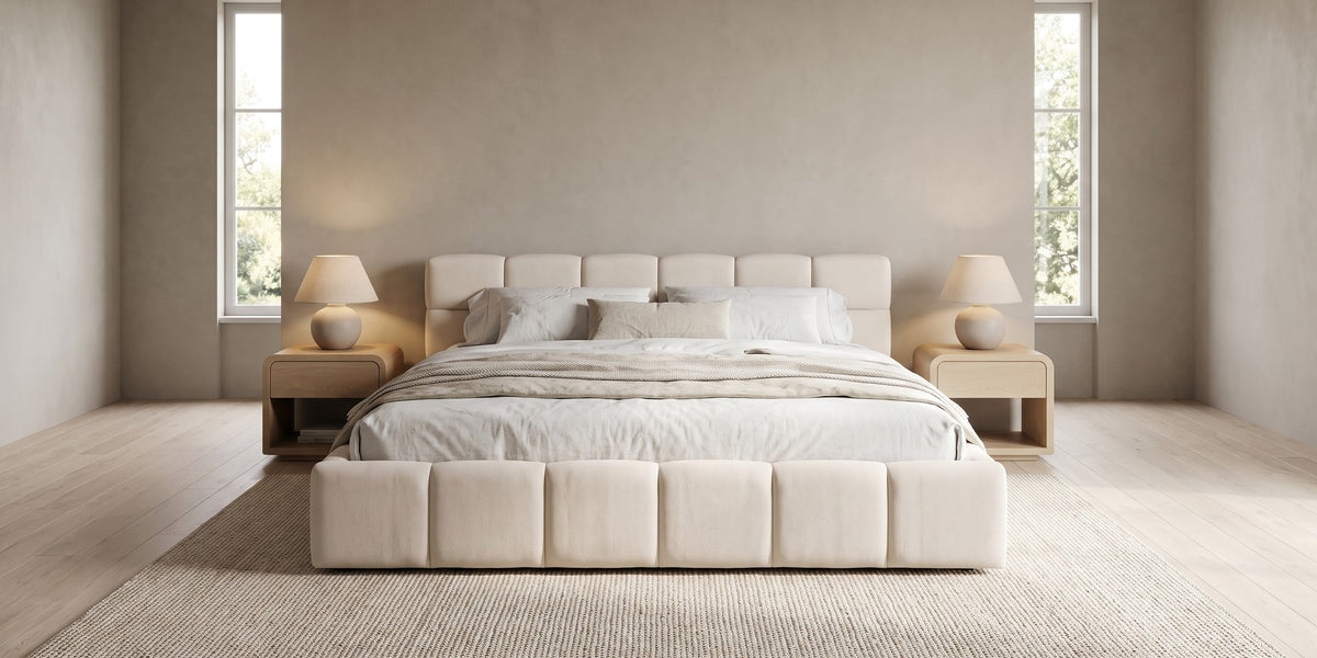Odette cream-beige chenille queen bed with a square-tufted headboard in a wide, calm bedroom