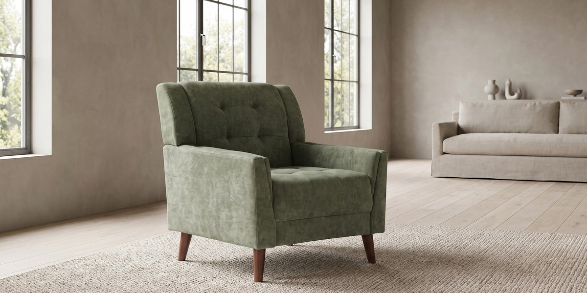 Opéra sage green tufted chenille mid-century armchair in a wide room view