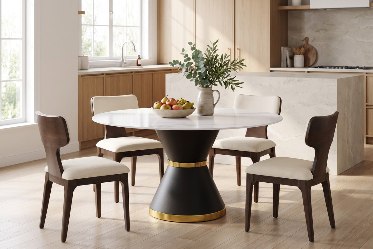 Orsay round sintered stone dining table with beige chenille chairs in a bright open-plan kitchen