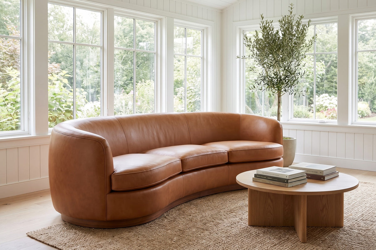 Pornic Cognac Curved Leather Sofa in a room