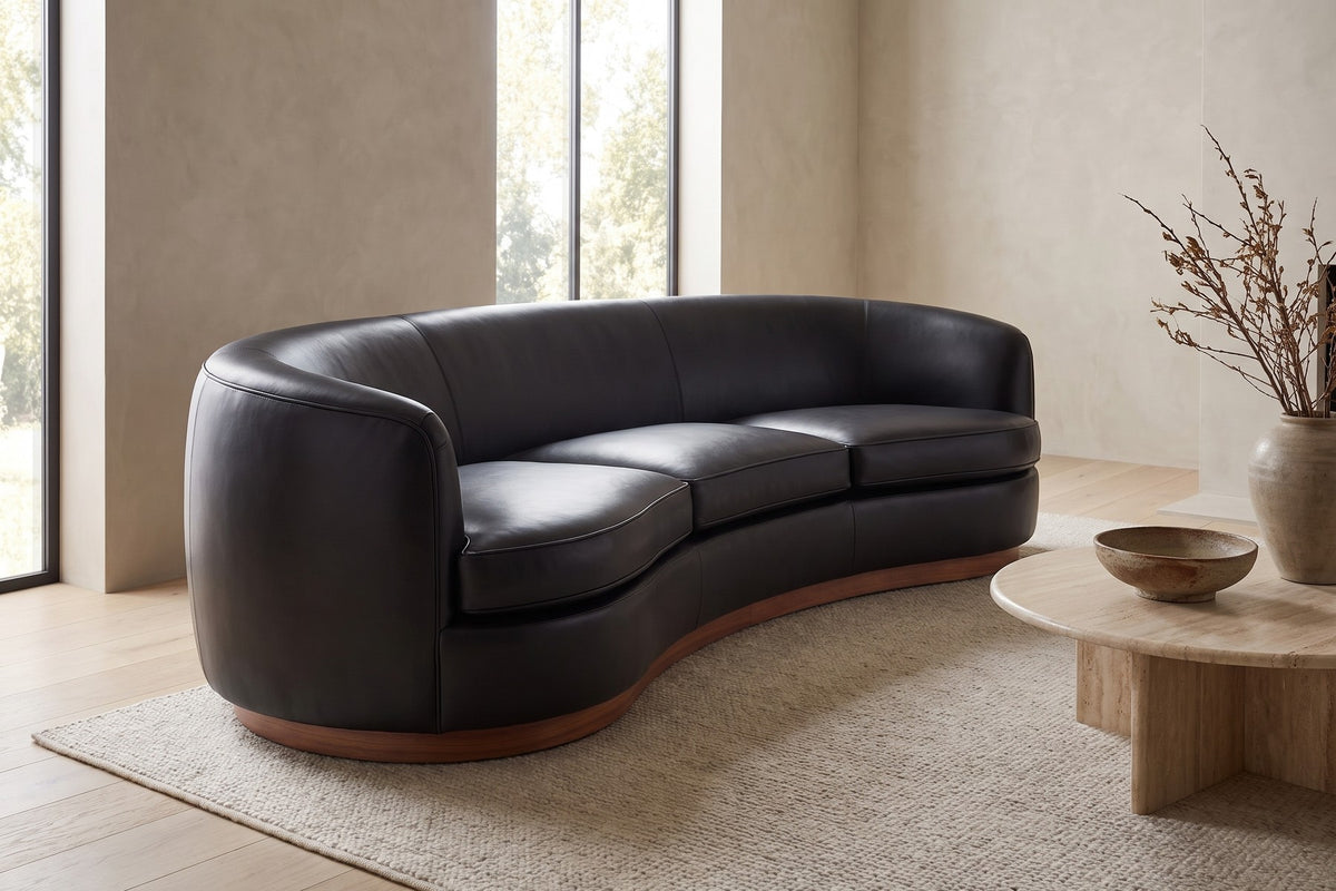 Pornic 94" Curved Leather Sofa – Crescent Back, Rounded Arms, Walnut-Finish Plinth
