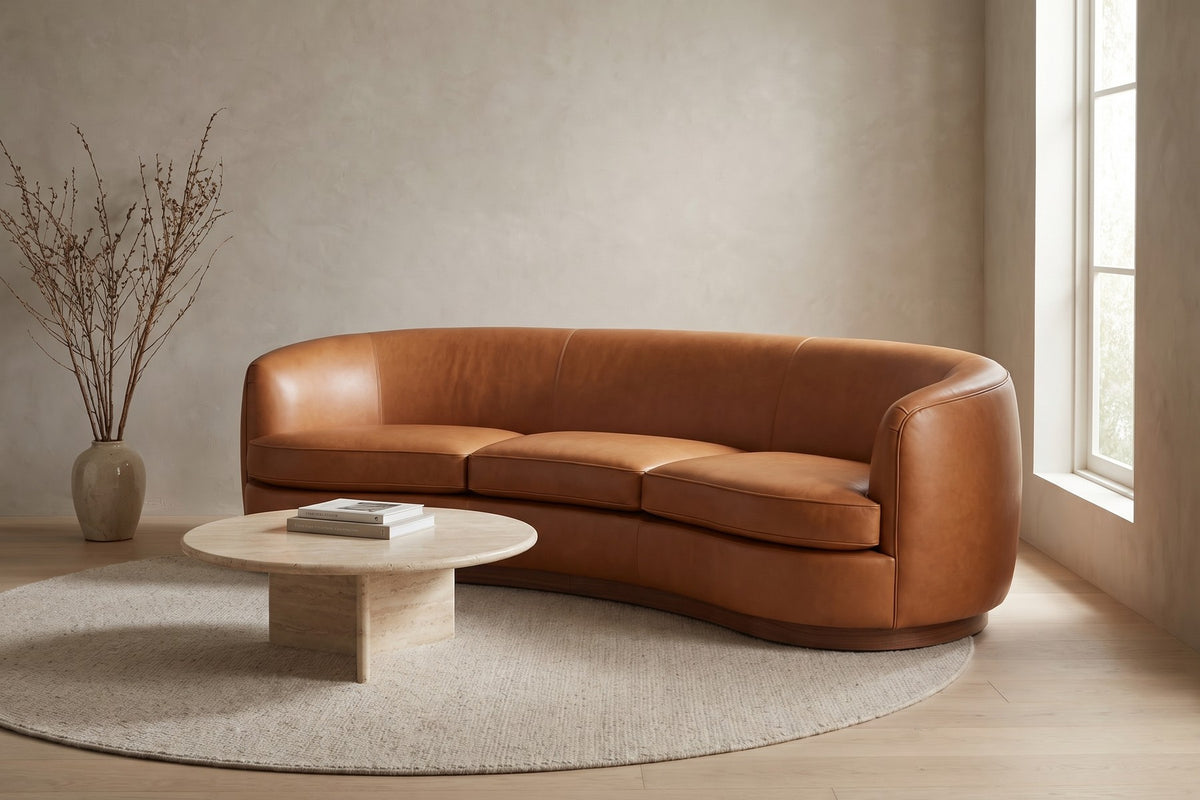 Pornic Cognac Curved Leather Sofa styled in a room