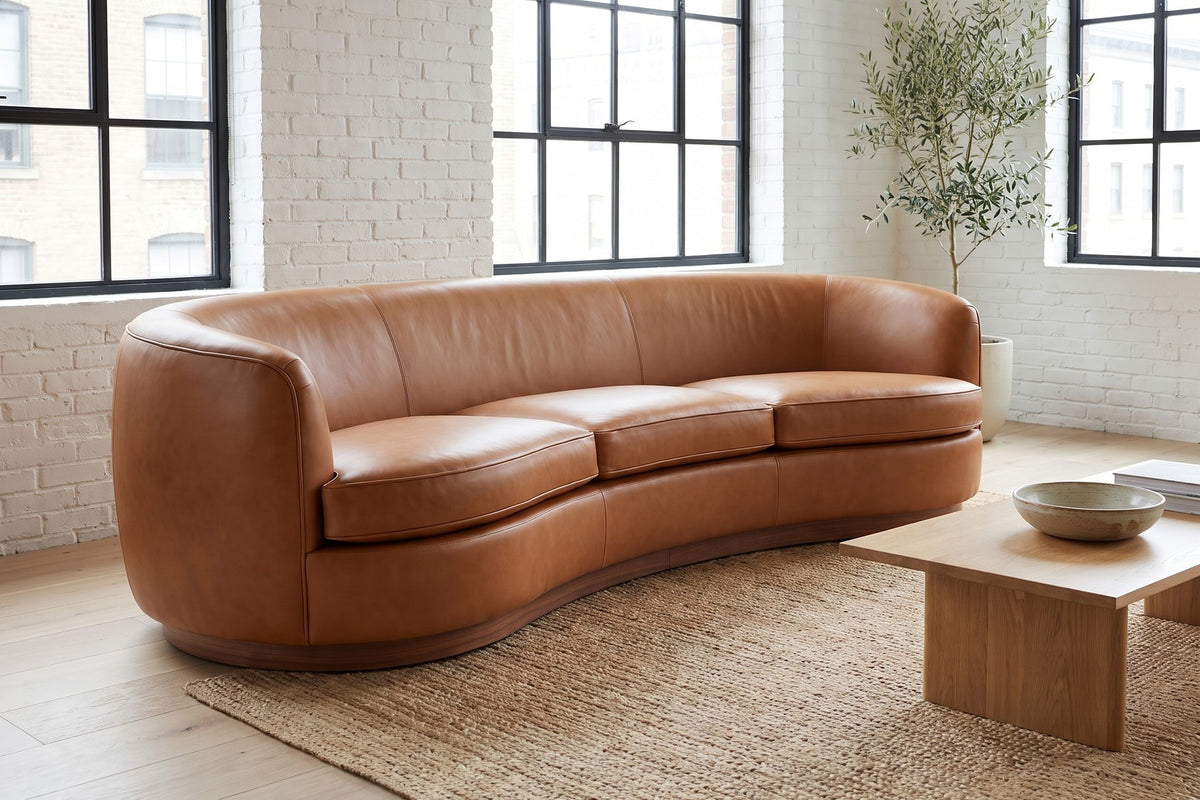 Pornic Cognac Curved Leather Sofa in a home