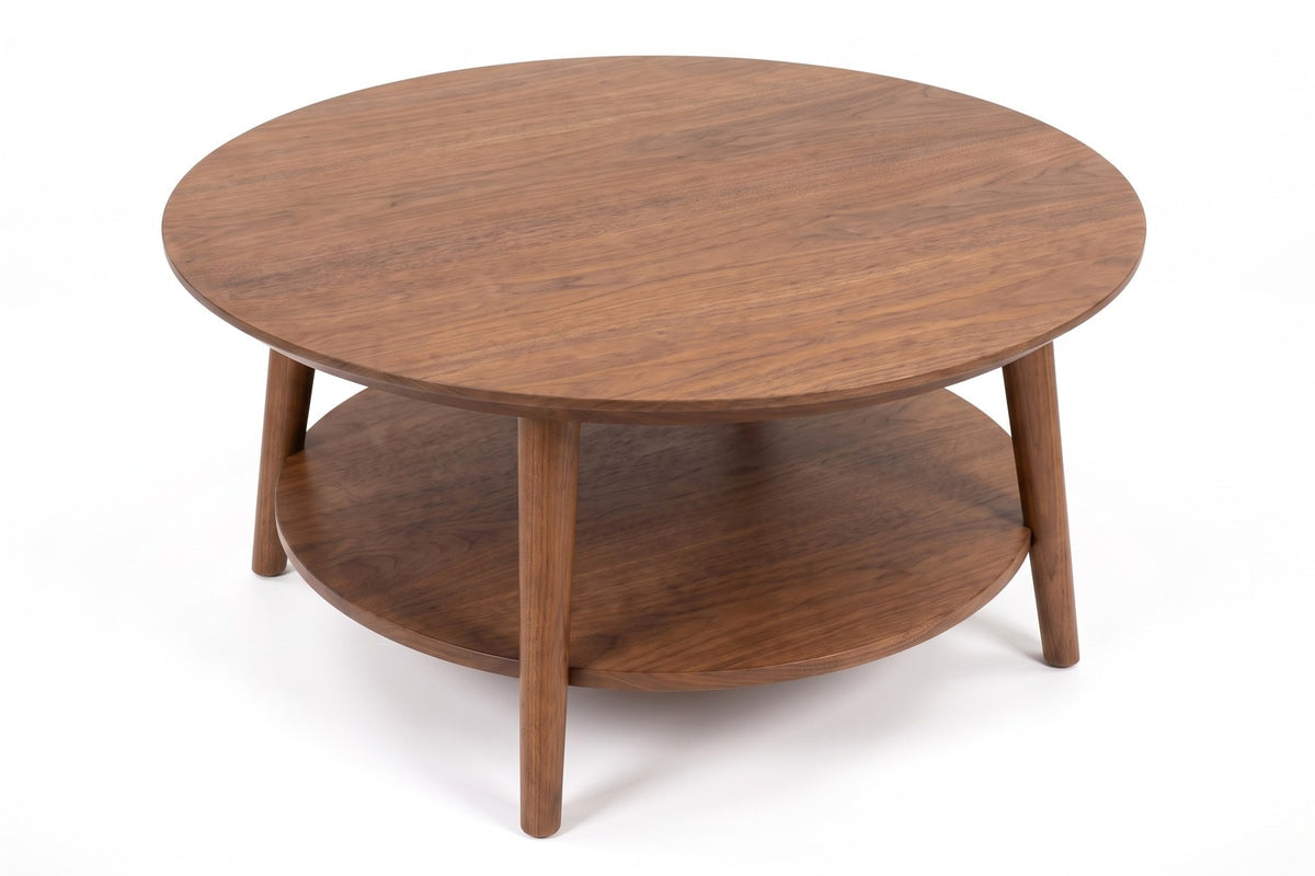 Ramatuelle Walnut Round Coffee Table, high three-quarter view from above, showing the round top and its grain
