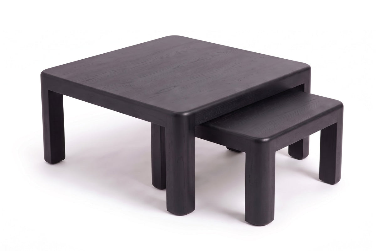 Roussillon Nesting Coffee Tables in Black Oak, three-quarter view on white
