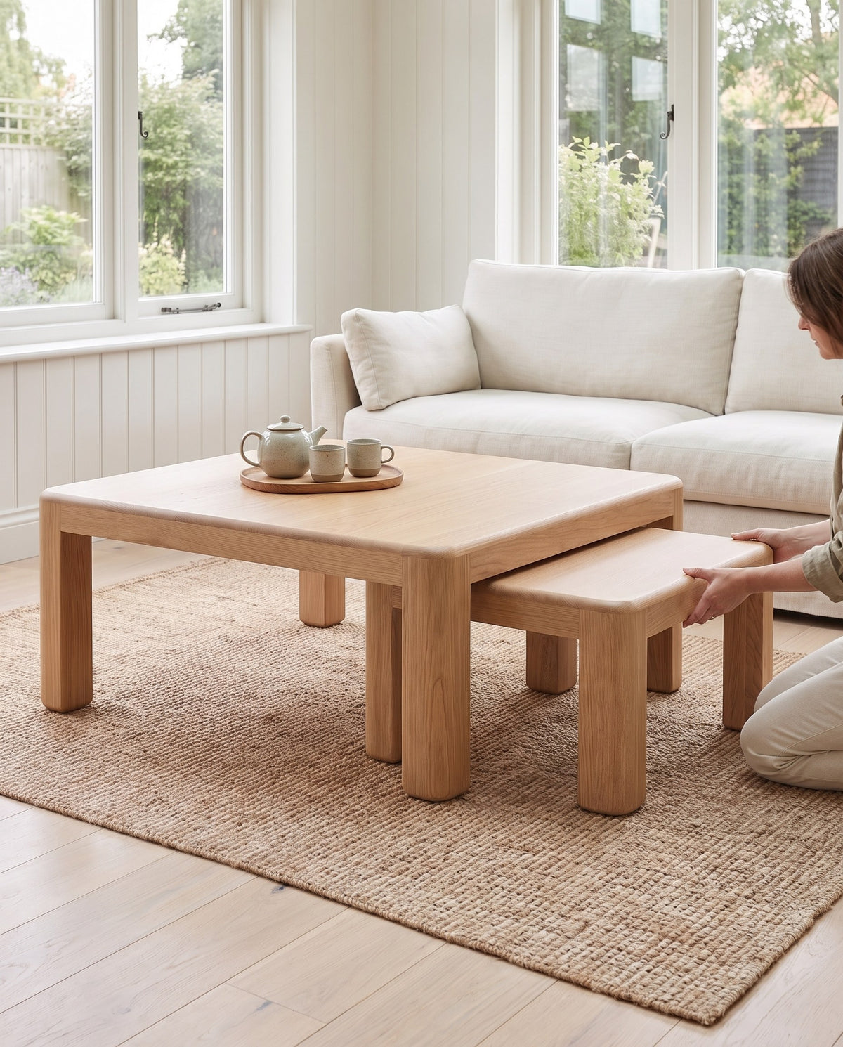 Sliding the small Roussillon oak table out from under the large one (concept image)