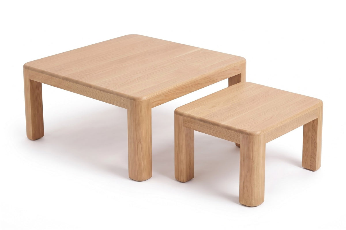 Roussillon Oak Nesting Coffee Tables, the two tables apart, side by side, in three-quarter view from slightly above