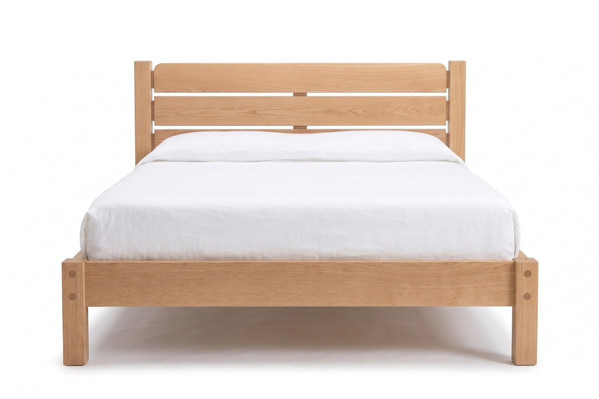 Sancerre Natural Oak Platform Bed, straight front view of the headboard from the foot of the bed, at mattress height