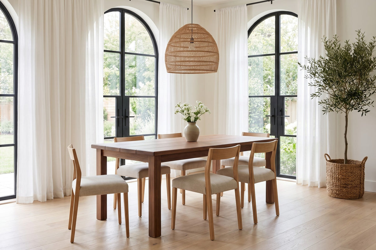 Sète Walnut Plank Dining Table in a room