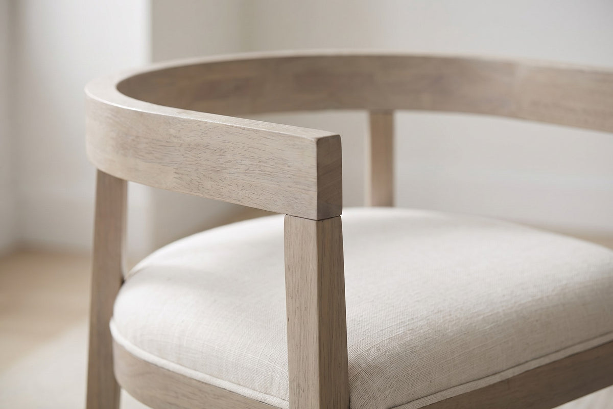 Close-up of the wide, curved light ash wooden rail where it turns from the back into the arm (Simone)
