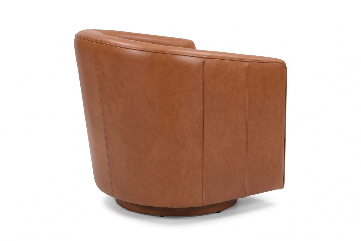 Solène Cognac Leather Swivel Chair, three-quarter view from the back right, showing the curved outside back and its stitched panel seams