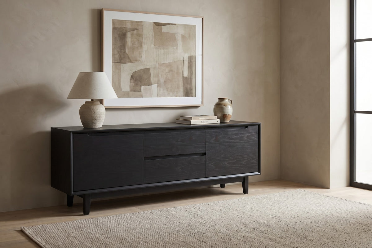 Valence Media Console in Black Oak, in a living space