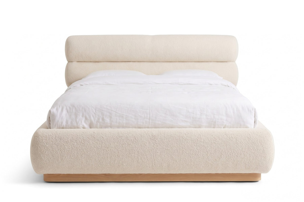 Valloire Ivory Bouclé Bed, straight front view of the headboard from the foot of the bed, at mattress height